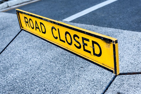 yellow-road-closed-sign-middle-road.jpg